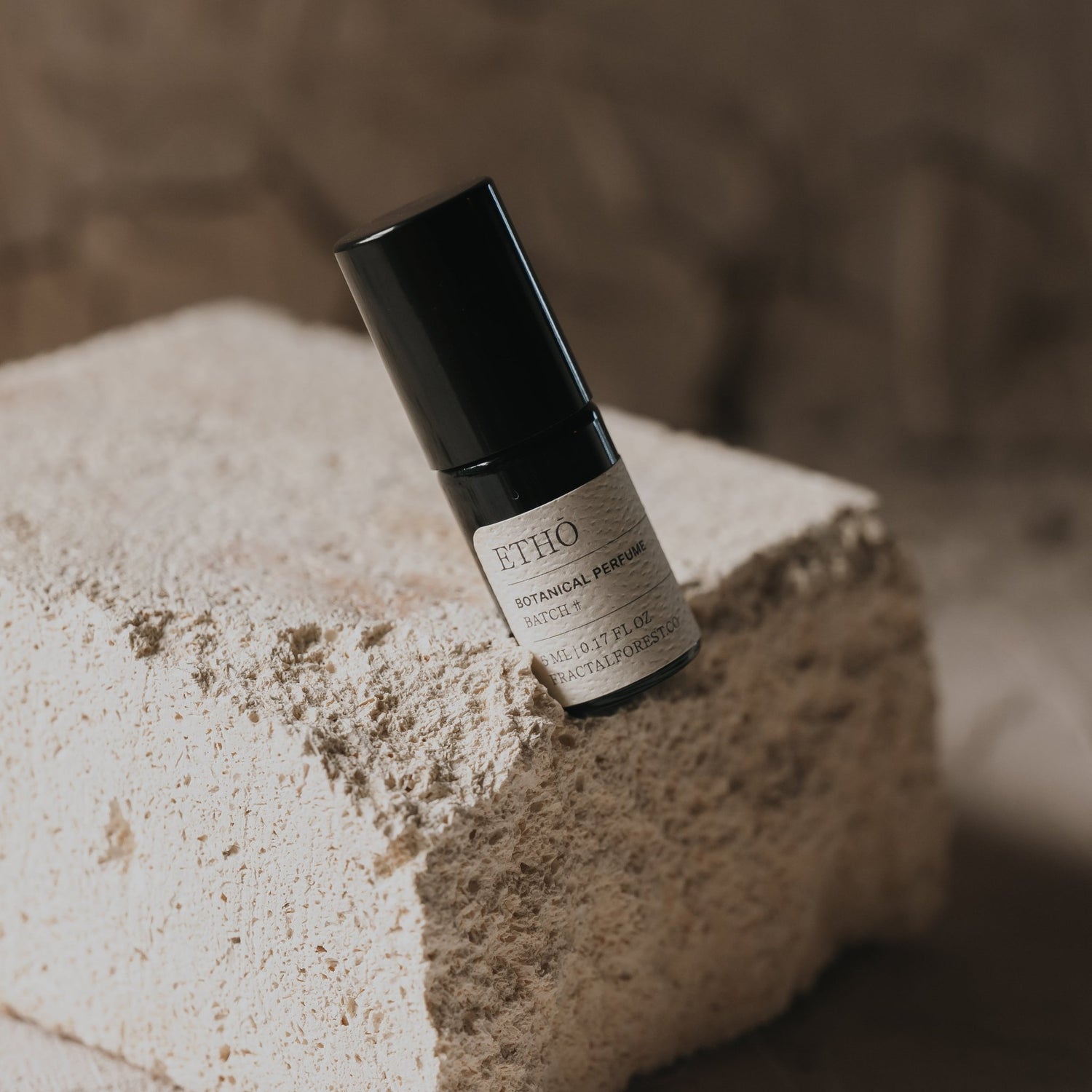 ETHŌ, front on shot of perfume bottle